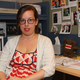 Shelham, who is somehow not nauseous with remorse and embarrassment, in her cubicle.